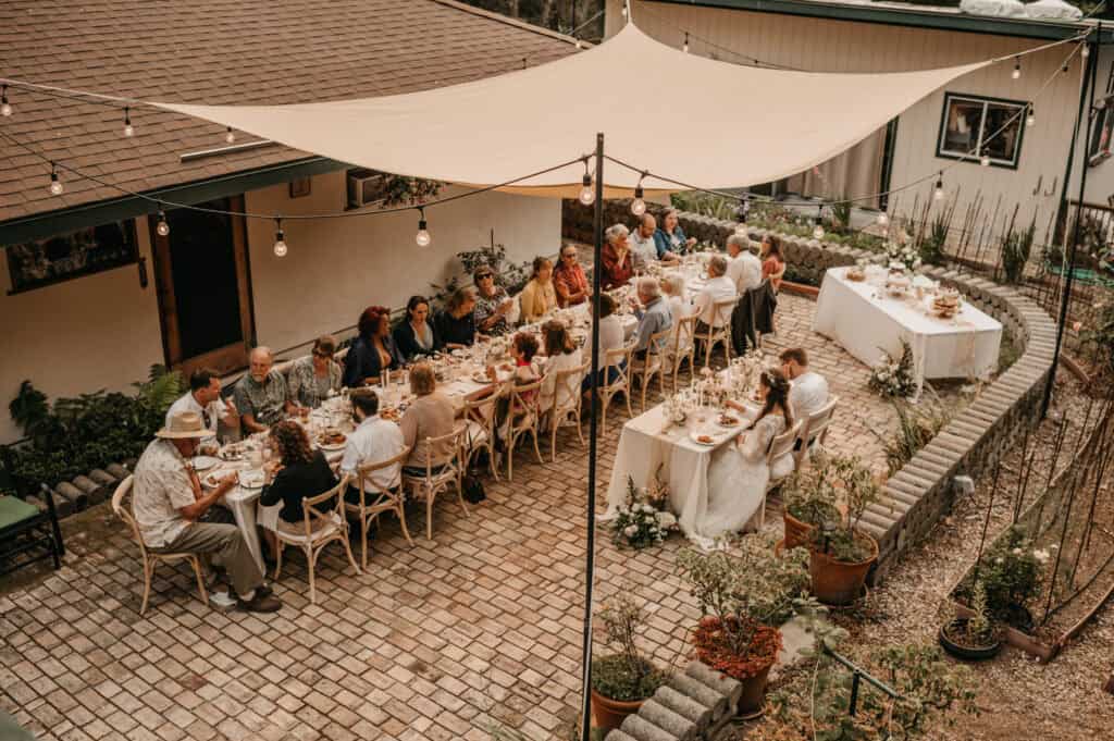 a bird eyes view of a wedding reception in walled garden