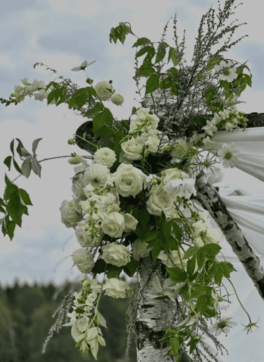 flower arrangement on a wedding arch
