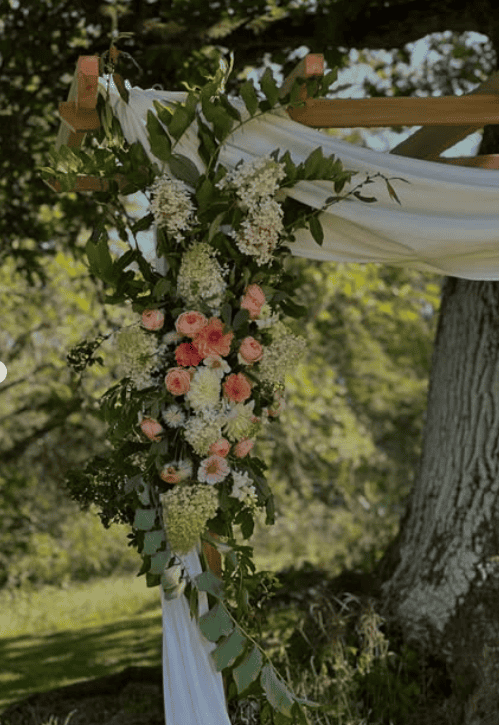 flower arrangement on a wedding arch