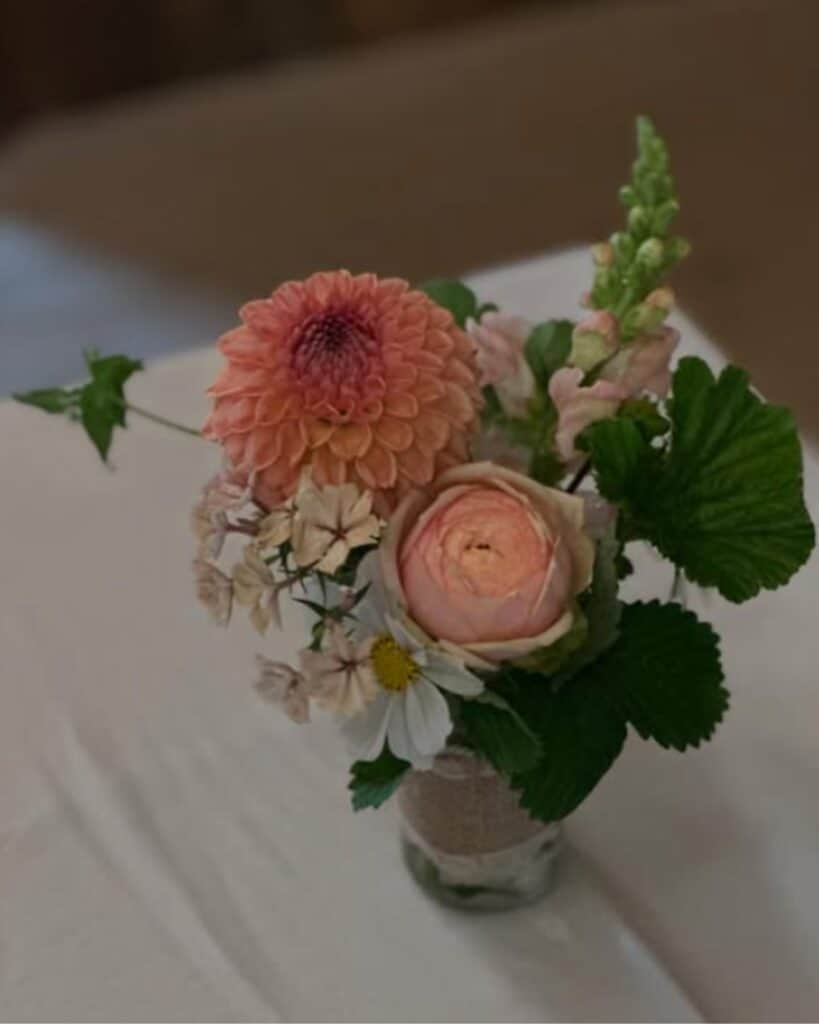 small bud vase with flowers